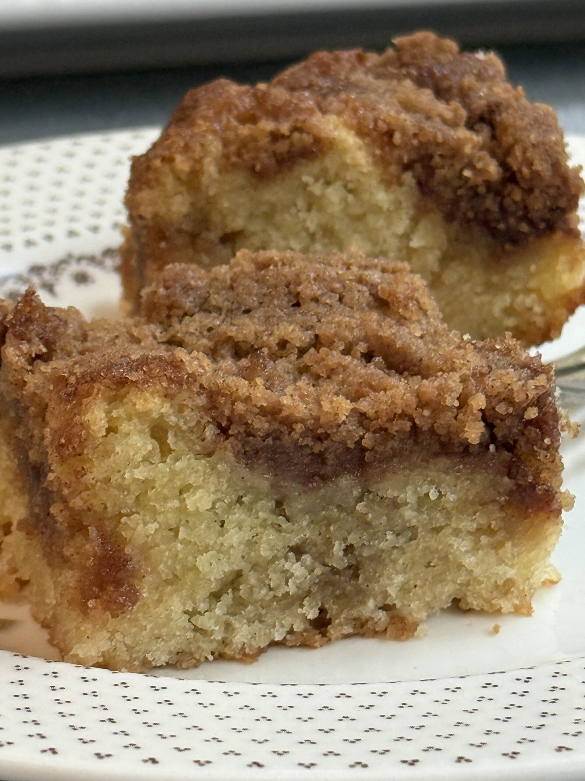 Easy homemade coffee cake recipe with double crumb layers on a plate ready to serve