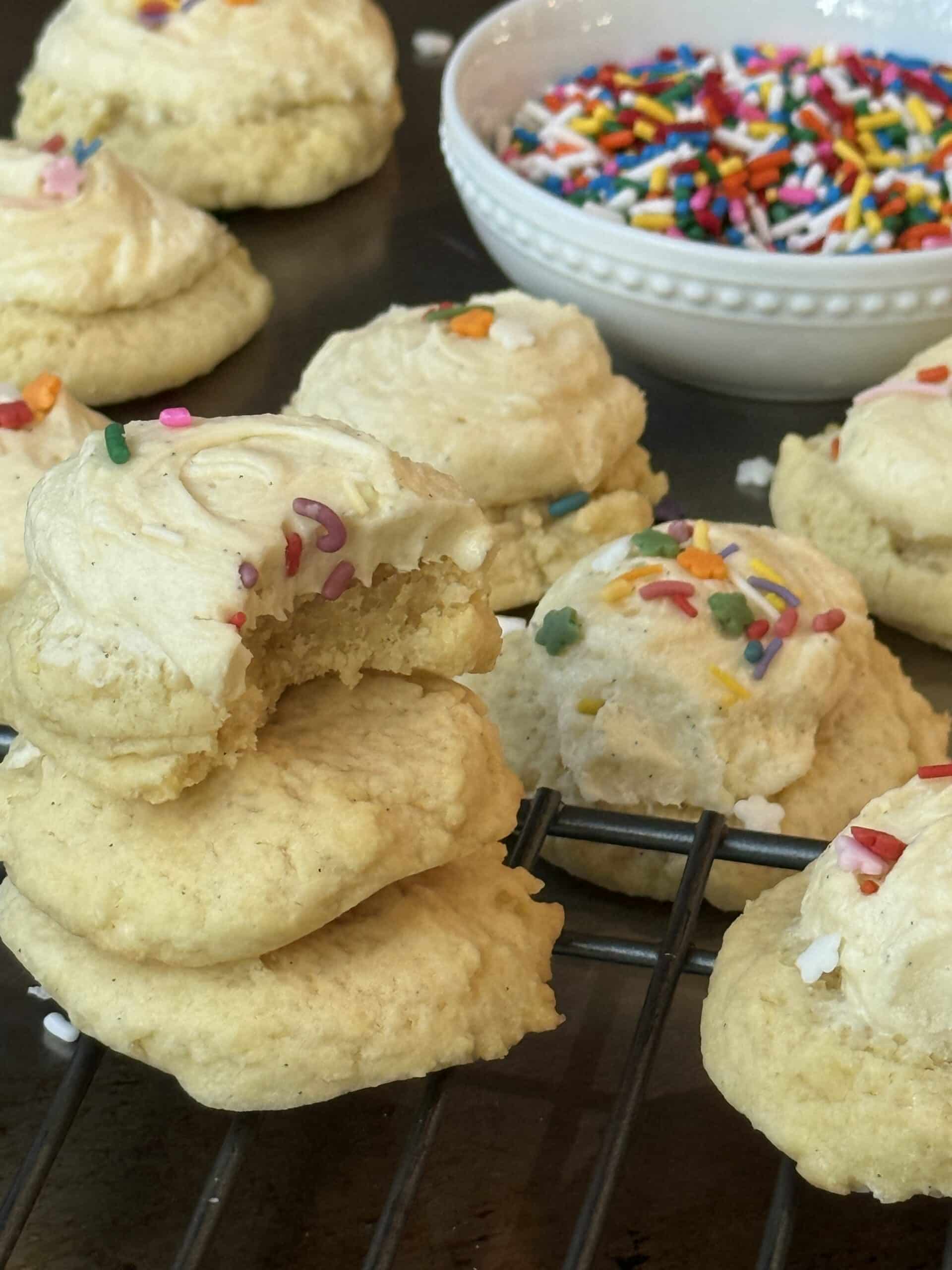 Christmas sugar cookies fully baked and frosted, perfect for holiday trays and gatherings.