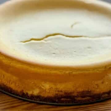 vanilla biscoff cheesecake showing a smooth, creamy texture and rich cookie crust